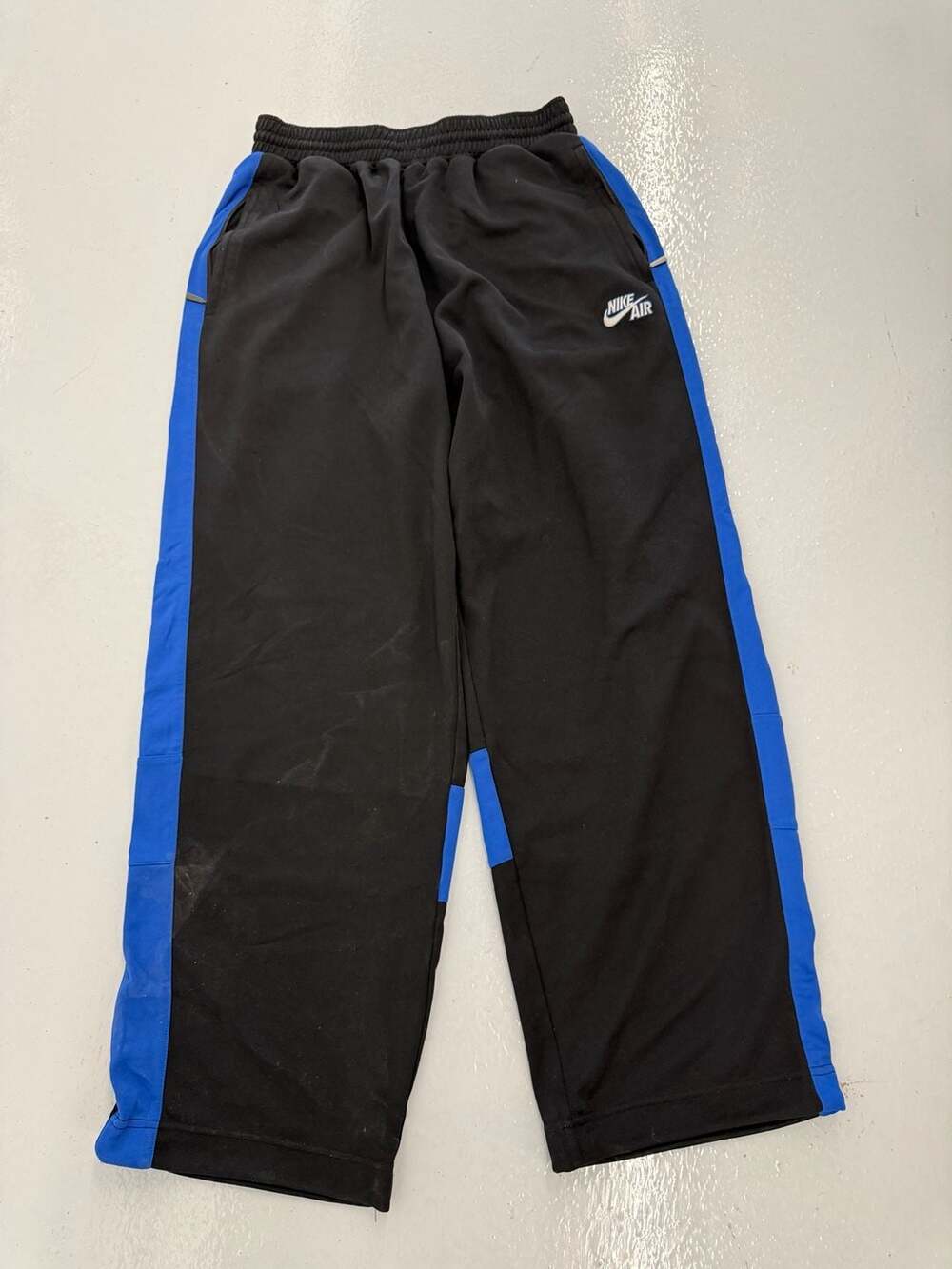 Nike Air Men's Athletic Windbreaker Track Pants Black and Blue